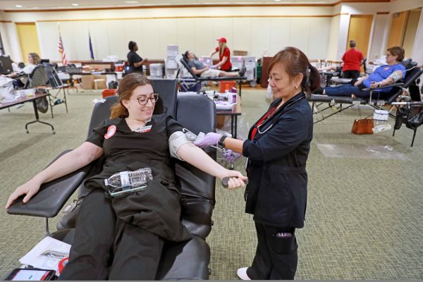 Nurse getting blood drawn during blood drive.