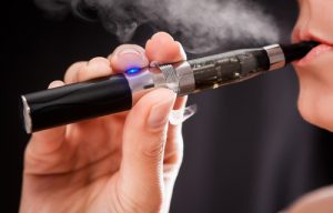 Person inhaling from a vape