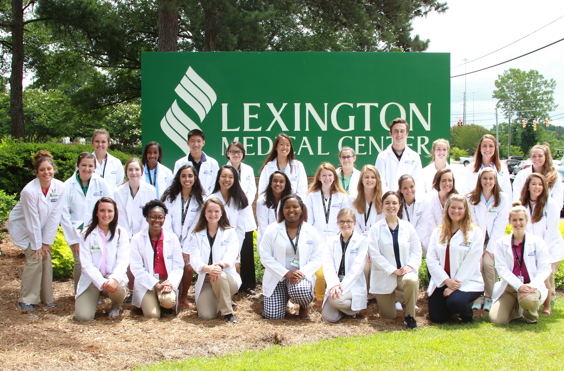 Students in front of Lexington Medical Center sign