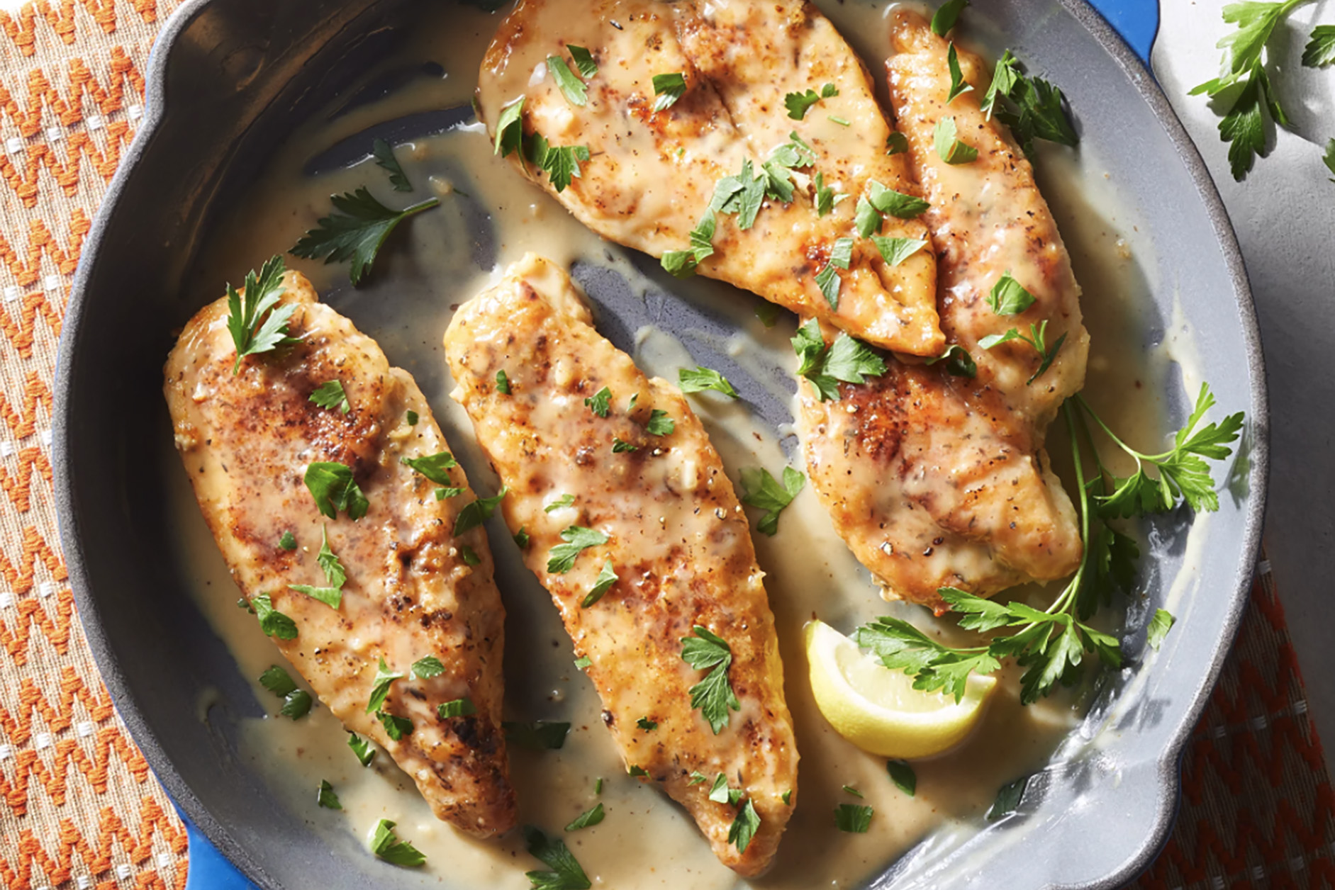 Creamy Lemon Chicken Cutlets in skillet