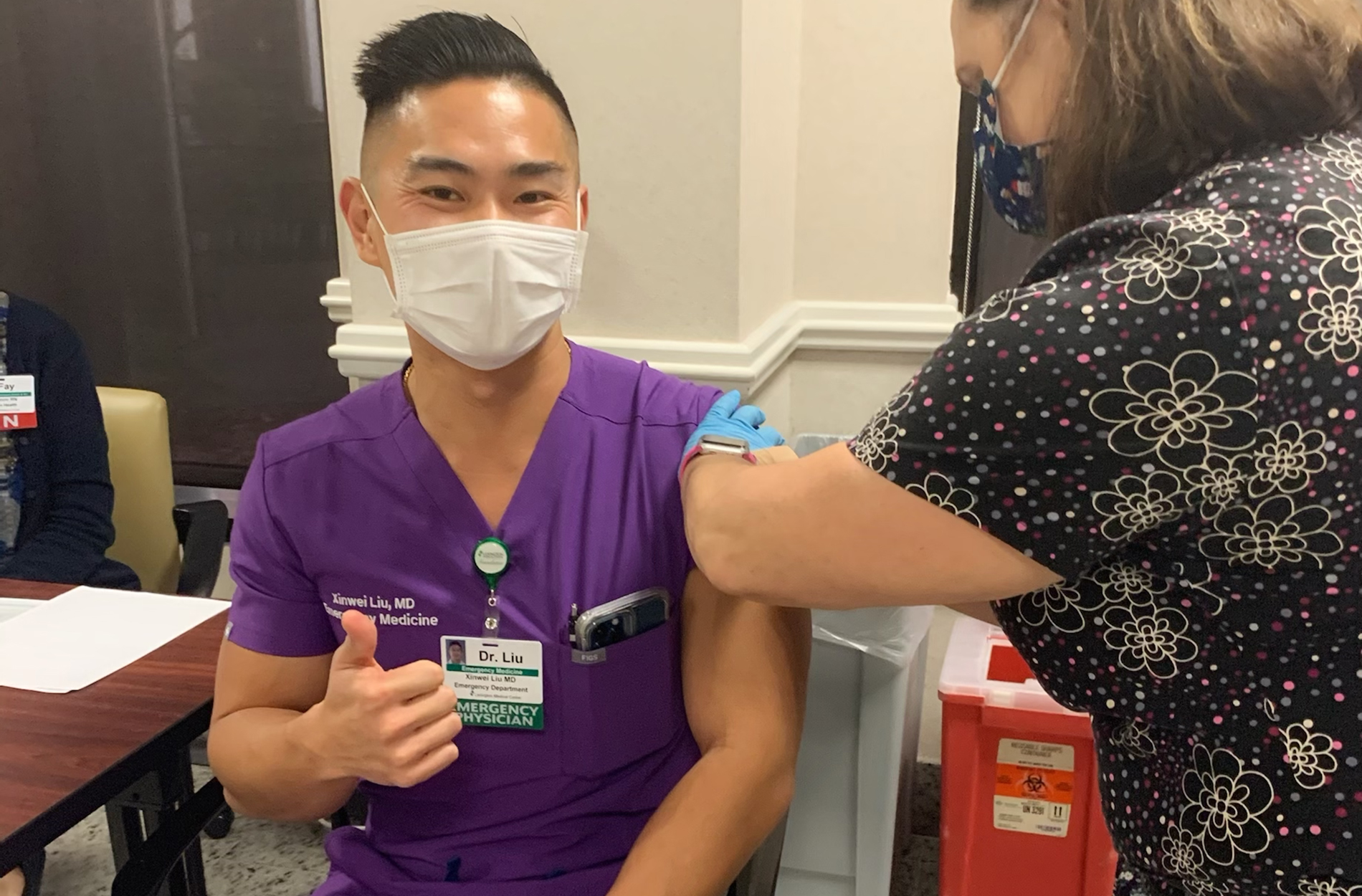 Dr. Liu getting vaccine