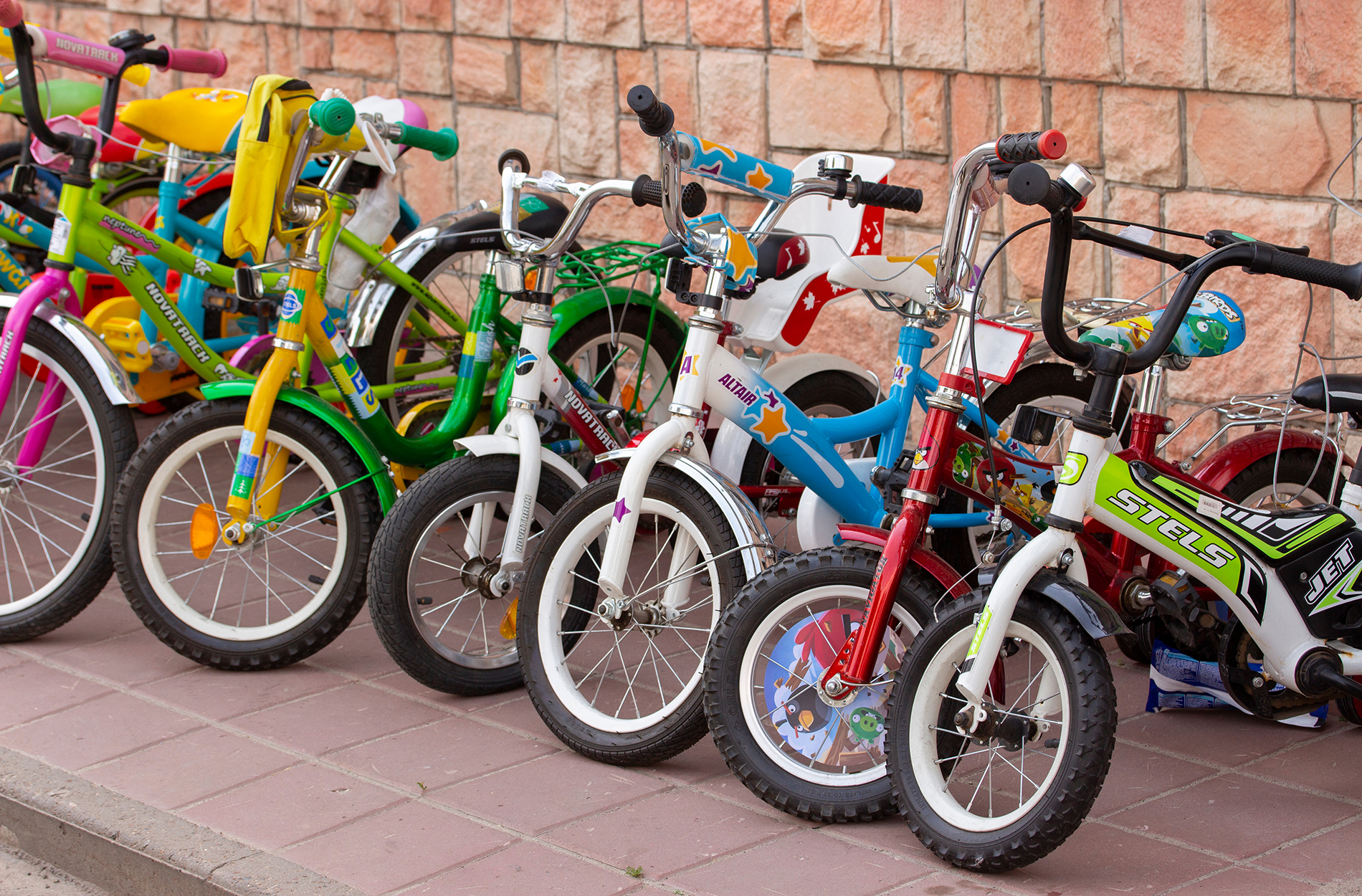 row of children's bicycles