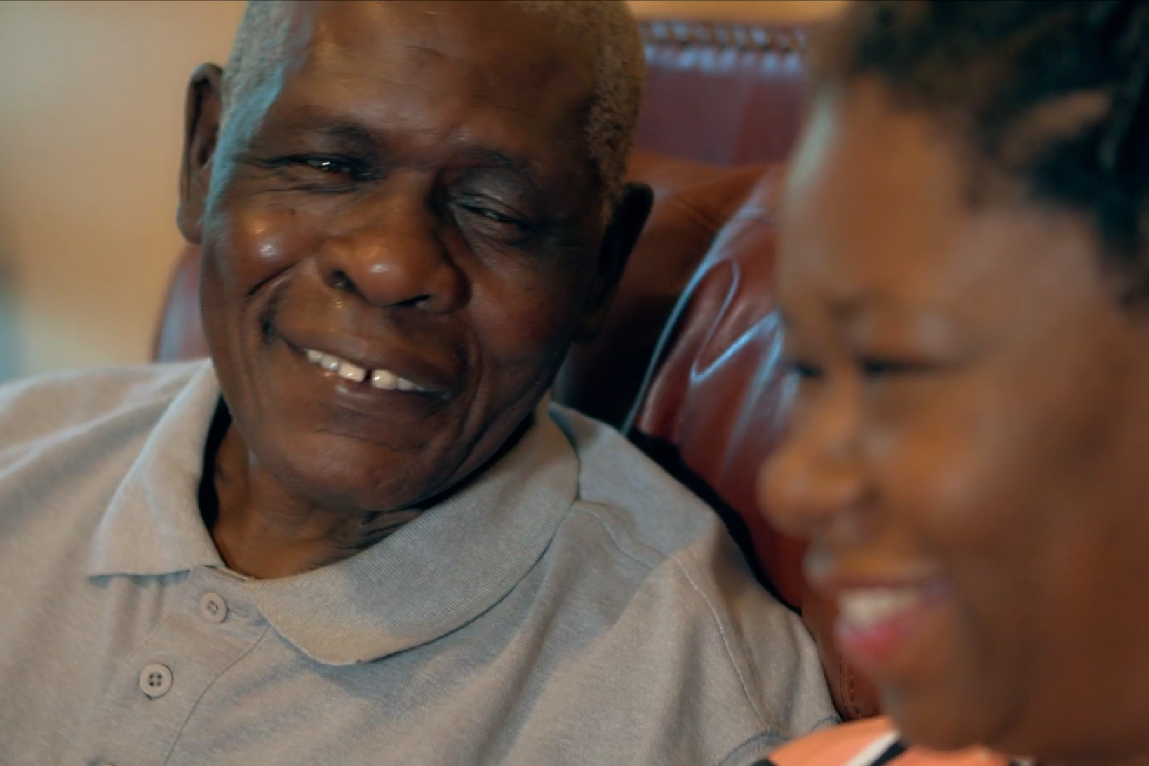 Patient Jeff Bennett, smiling for the camera next to his wife.