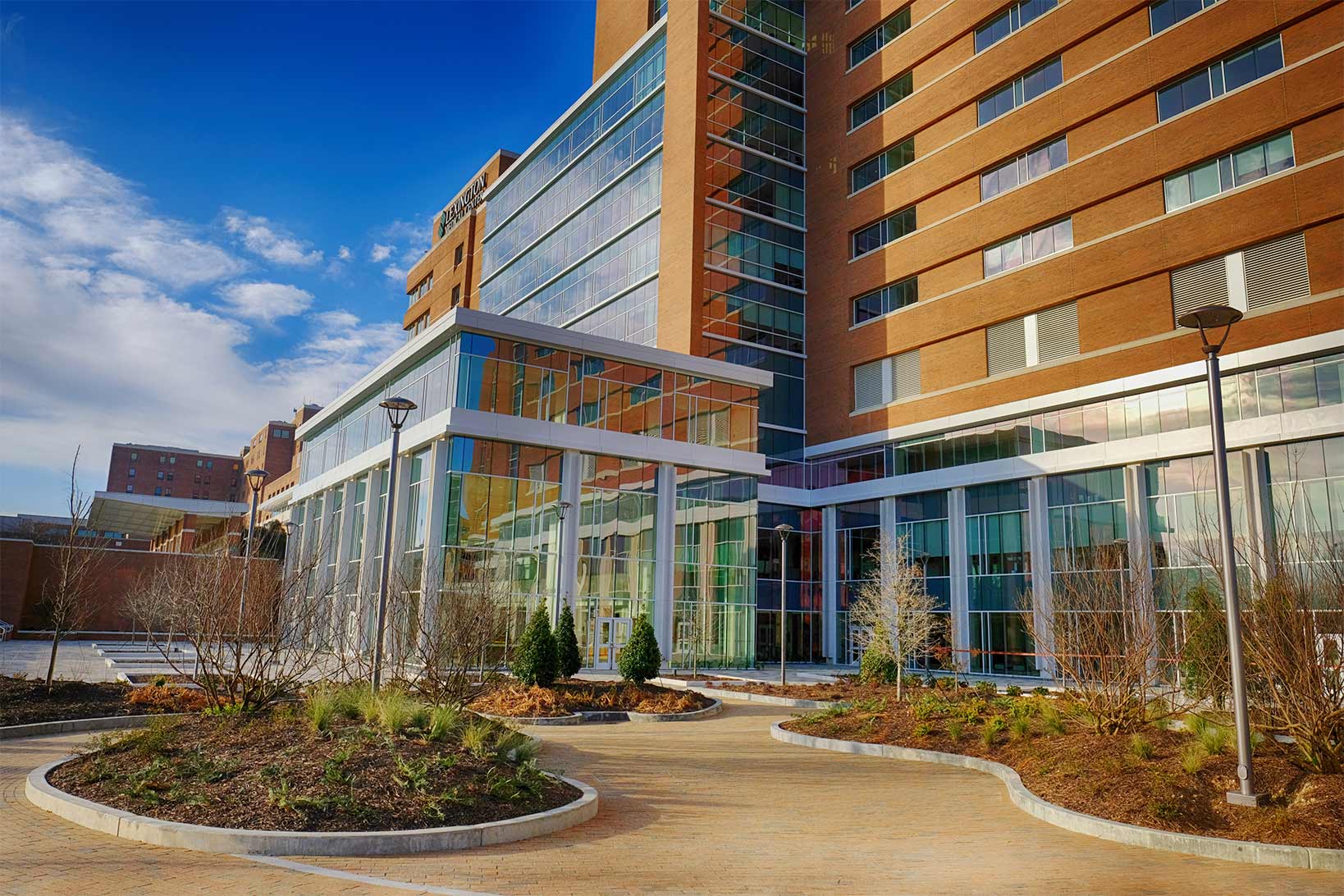 The front of Lexington Medical Center and the serenity garden on a sunny day.