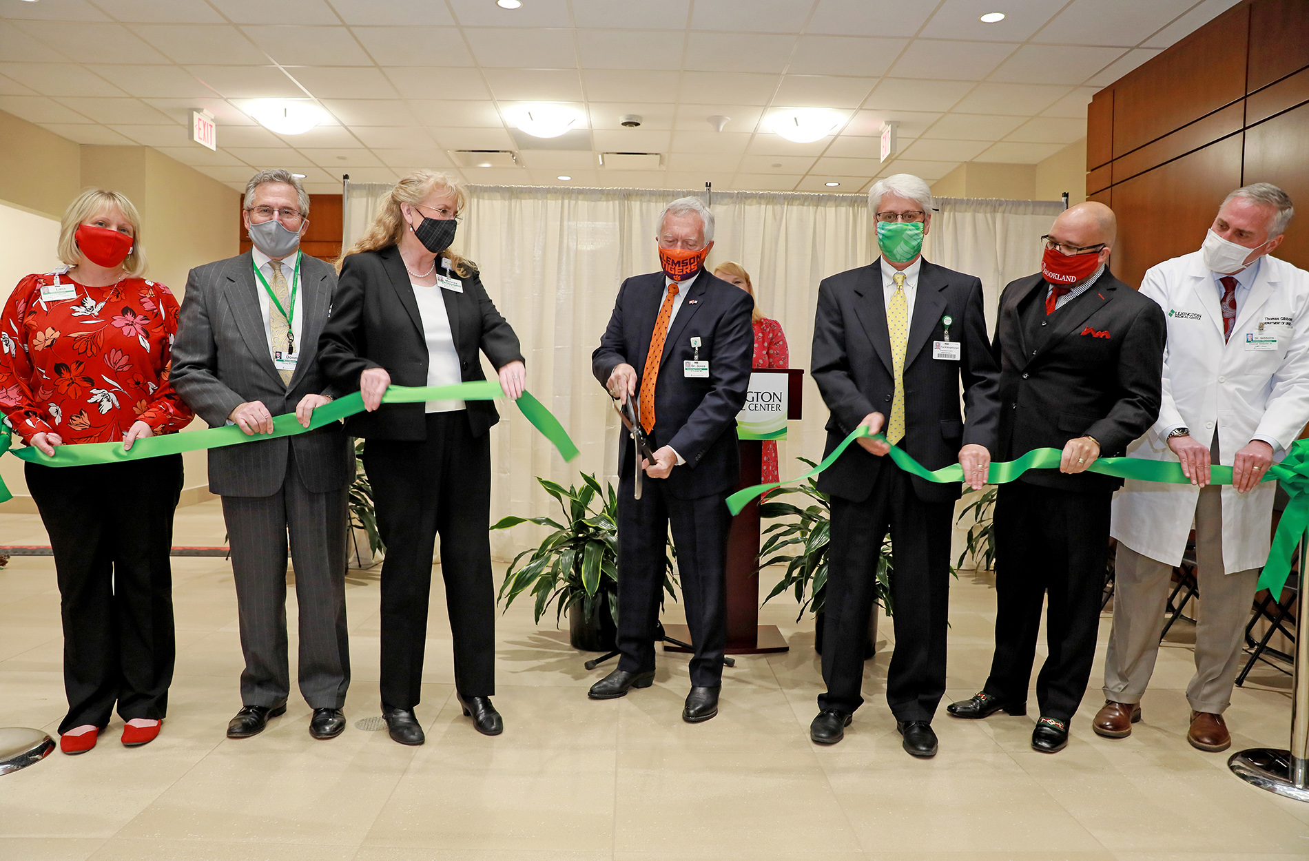 LMC Board Chair and others cutting ribbon