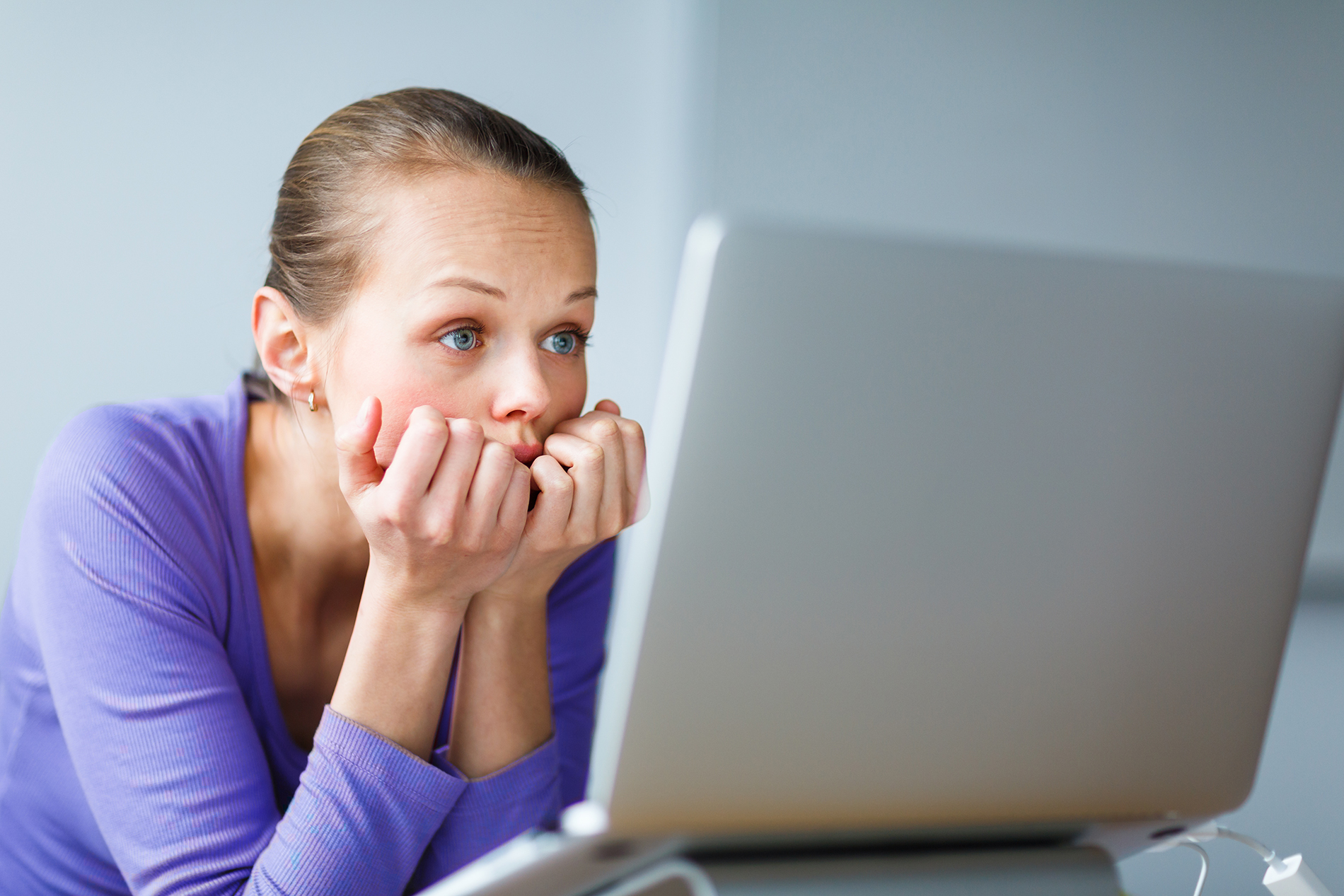 Woman staring at computer screen