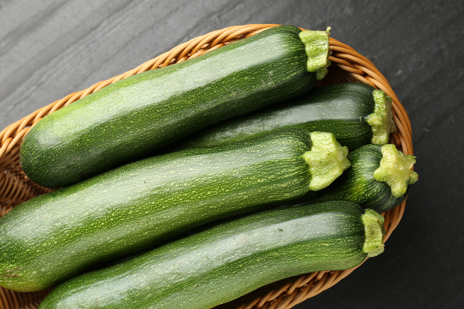 zucchini in wicker basket