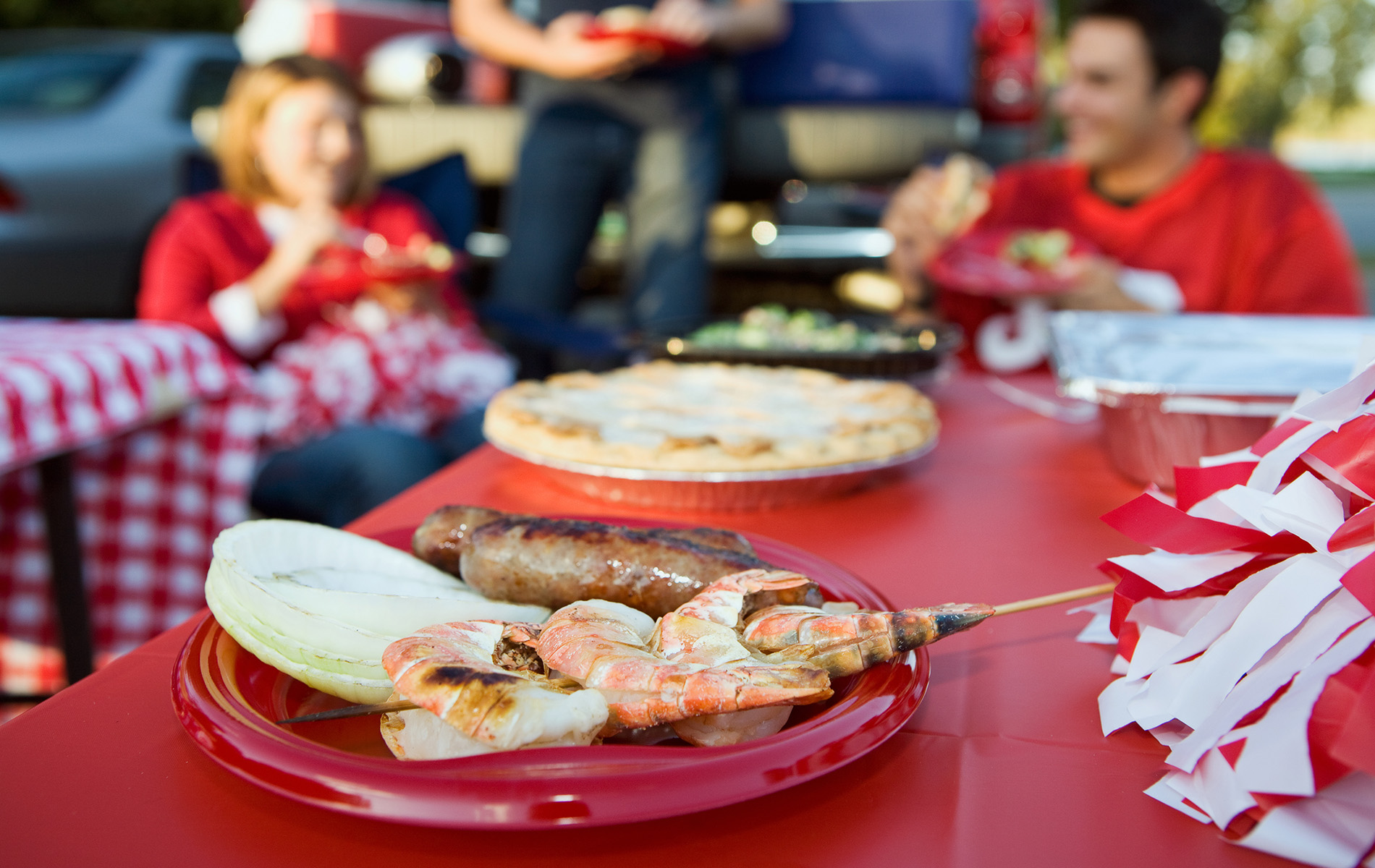 shrimp and meat on platter at tailgate event