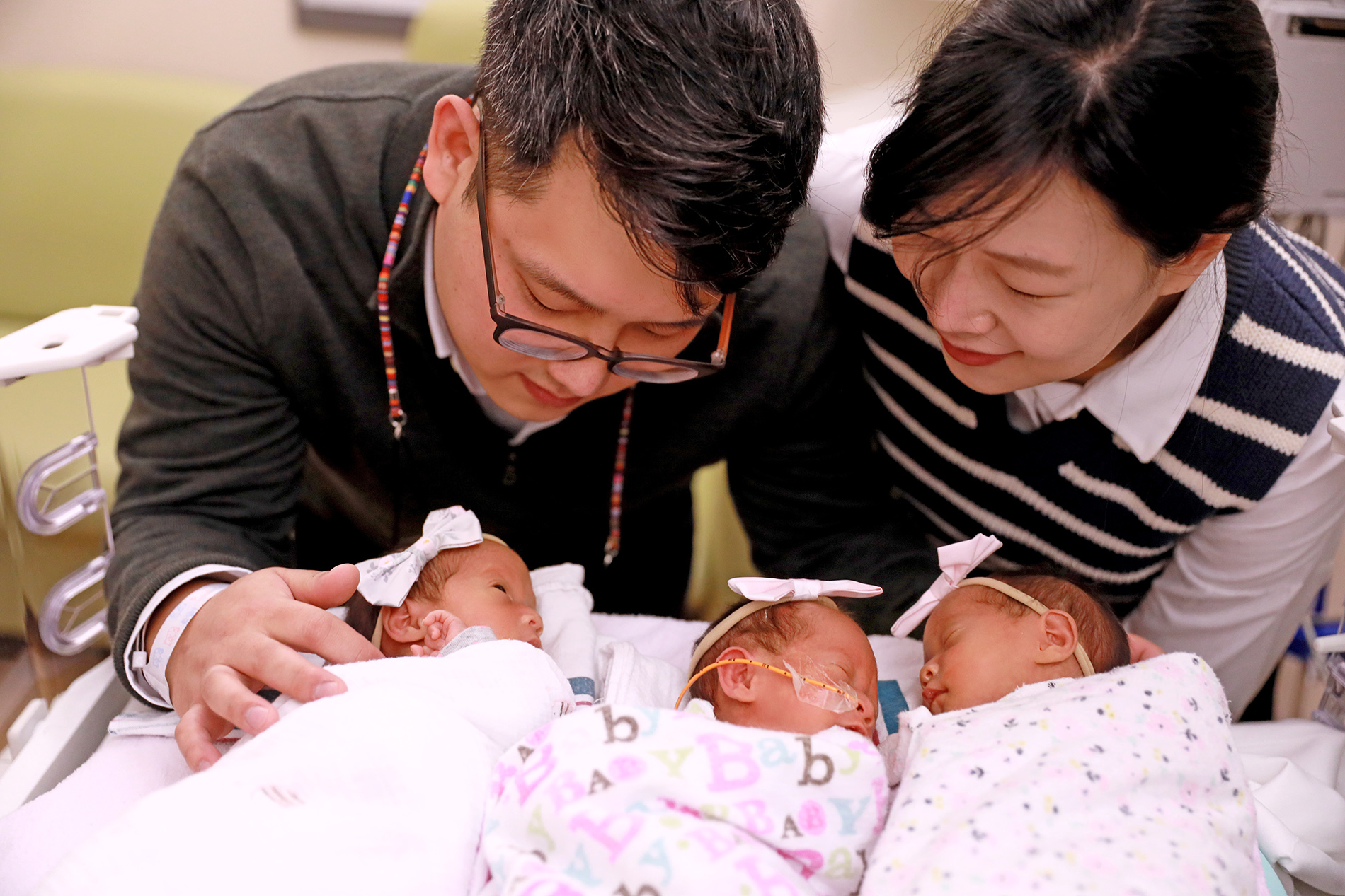 Parents with identical triplets