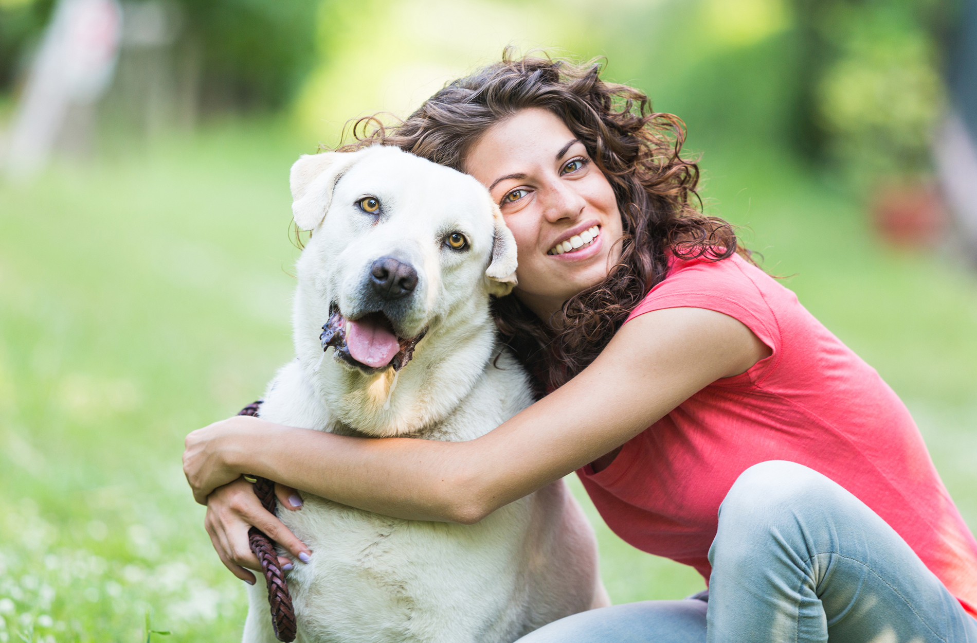 Young woman with Golden Retriever