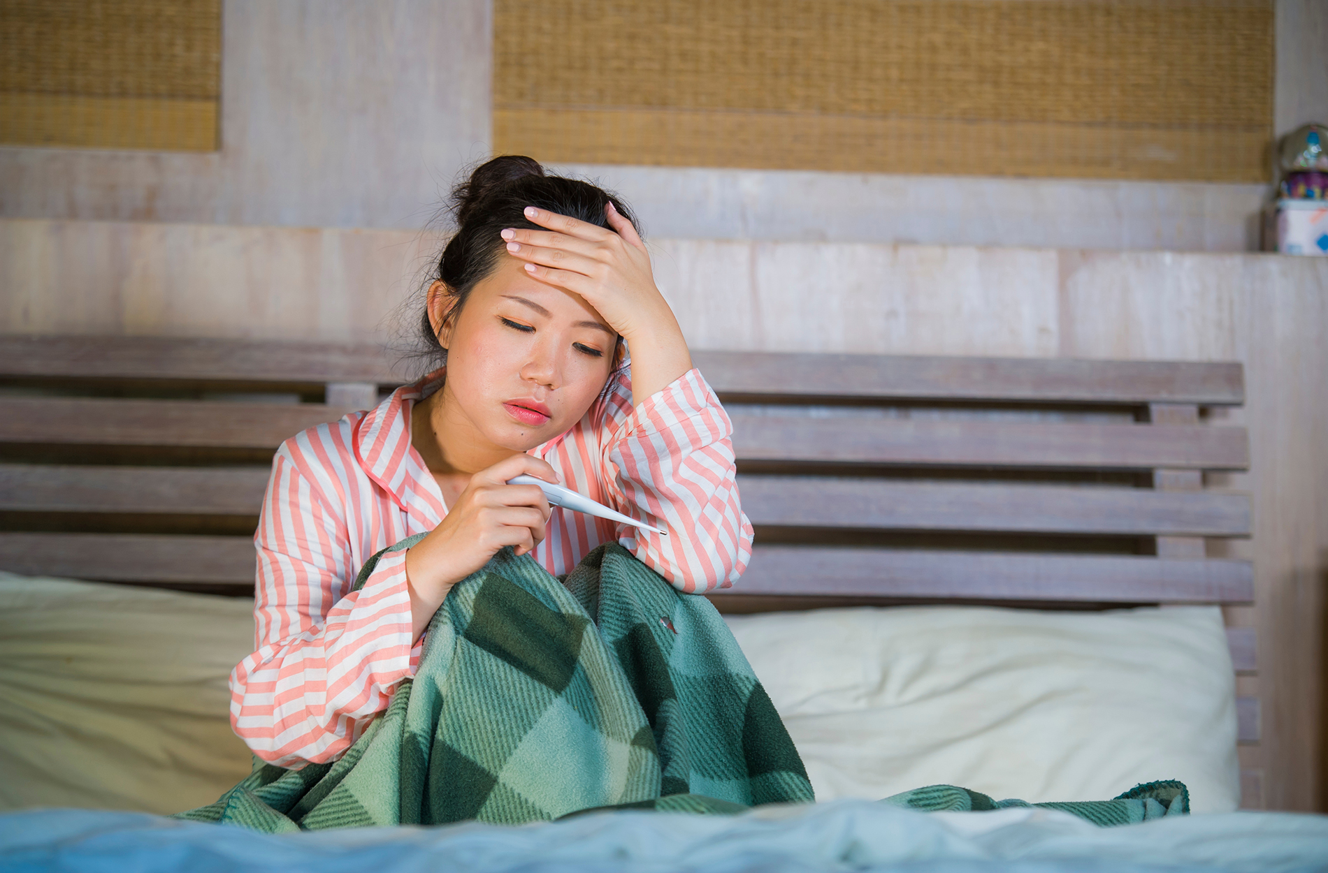 Sick woman on couch