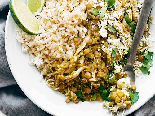cilantro lime chicken with lentils in white bowl