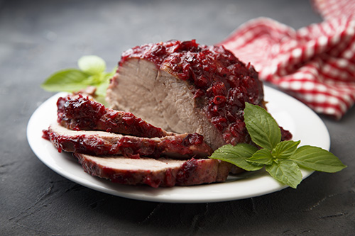 Pork loin with blueberry port wine sauce
