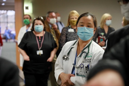 vaccine021 Lexington Medical Center employees watching nurse receive first COVID-19 vaccination